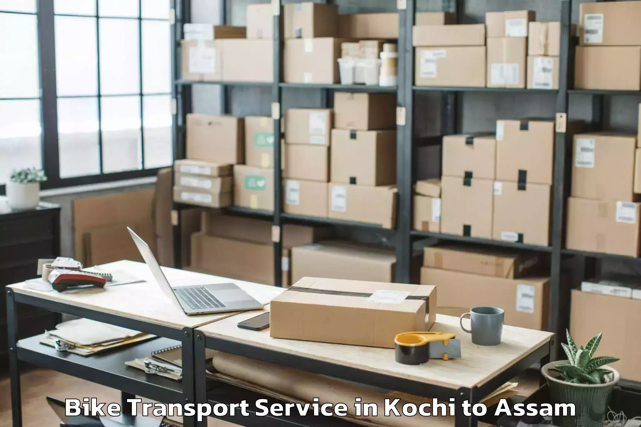 Hassle-Free Kochi to Behali Bike Transport